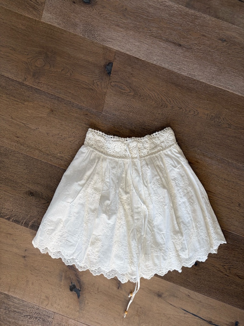 White drawstring skort with embroidery